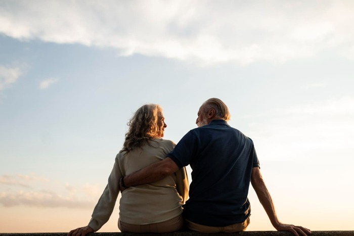 widow and widower sitting together